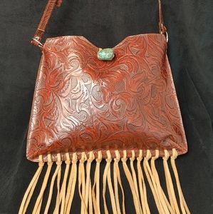 Barse hand tooled leather purse.. carried it one time...